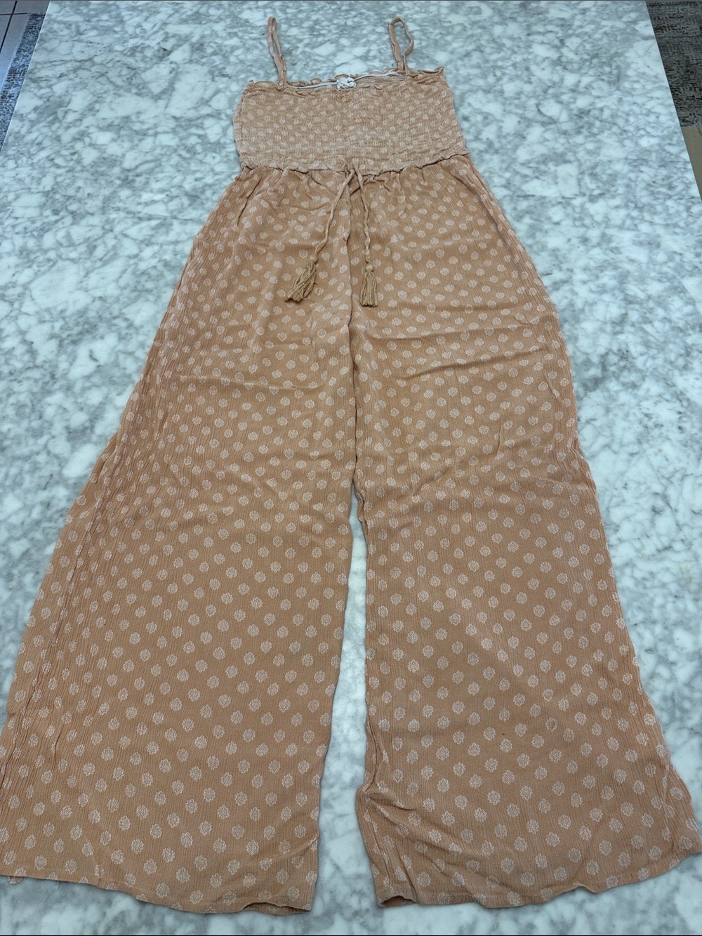 Sincerly Jules Peach Printed Smocked Wide-Leg Jumpsuit with Tassel Tie